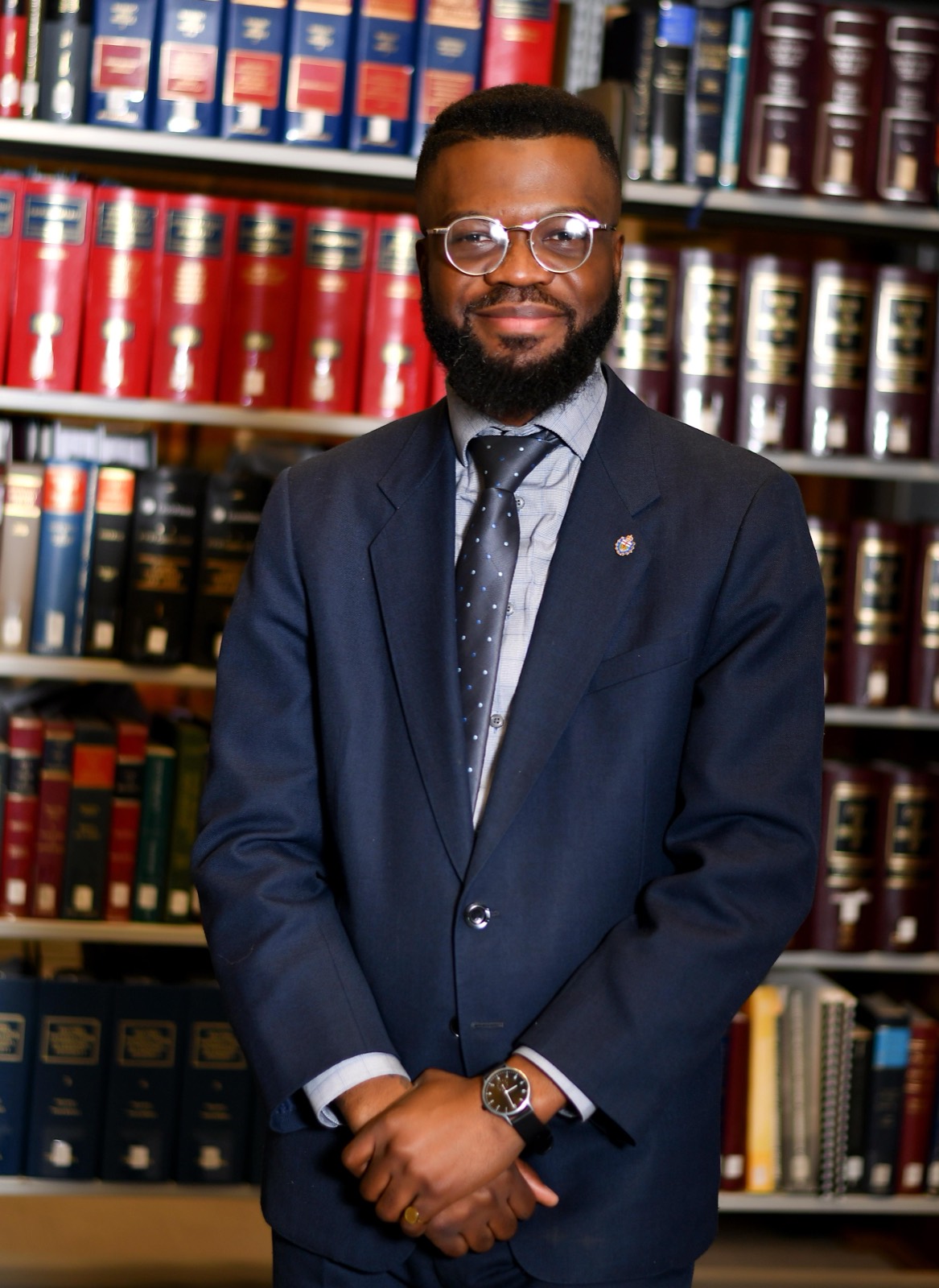 JRD Kwilu, Founder of Kwilu Law Chamber, in the firm's law library