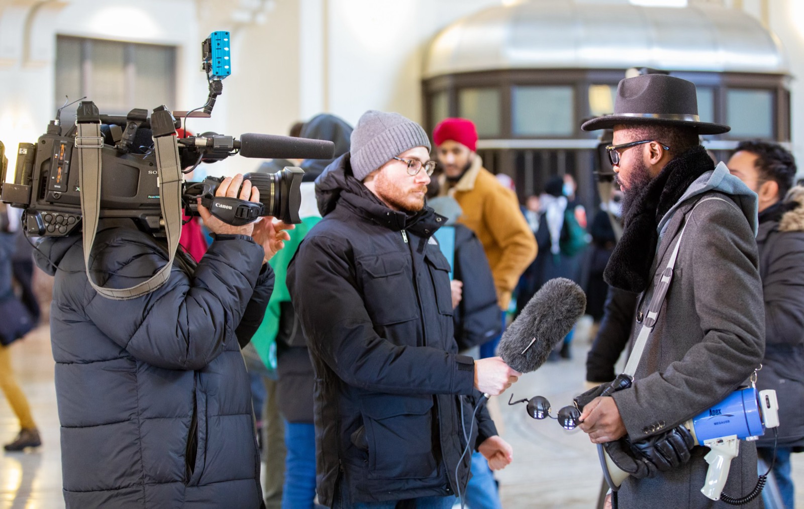 JRD Kwilu on camera for a news segment